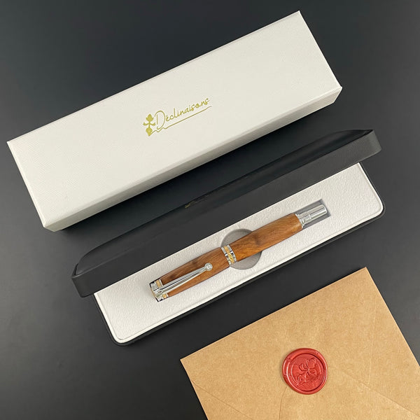 Stylo Roller Luxe Bois Loupe de Thuya du Maroc avec éléments plaqué Or 24k et Cristal. Personnalisable et livré avec boîte cadeau luxe.