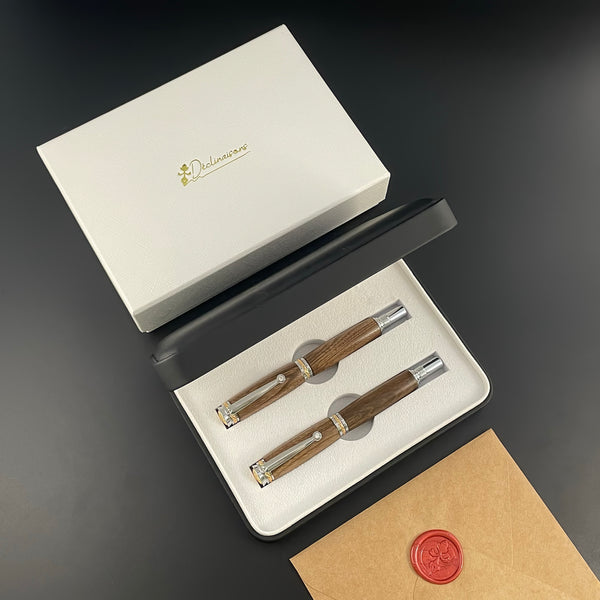 Parure 2 Stylos Luxe Bois Noyer des Pyrénées, avec éléments plaqué Or 24k et Cristal. Personnalisé et livré avec boîte cadeau luxe.