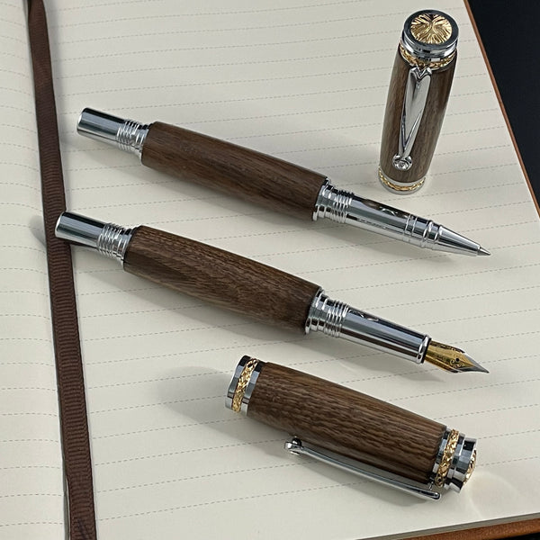 Parure 2 Stylos Luxe Bois Noyer des Pyrénées, avec éléments plaqué Or 24k et Cristal. Personnalisé et livré avec boîte cadeau luxe.