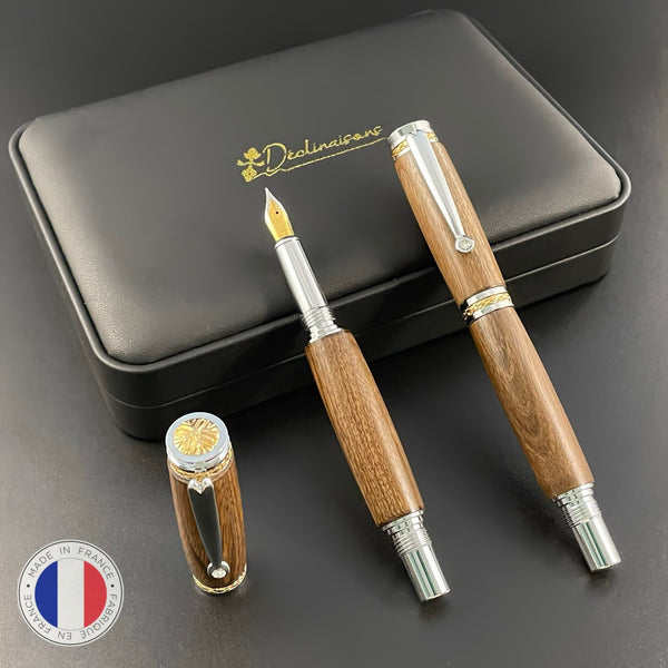 Parure 2 Stylos Luxe Bois Noyer des Pyrénées, avec éléments plaqué Or 24k et Cristal. Personnalisé et livré avec boîte cadeau luxe.