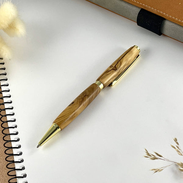 Stylo bois d'olivier doré. Stylos Déclinaisons