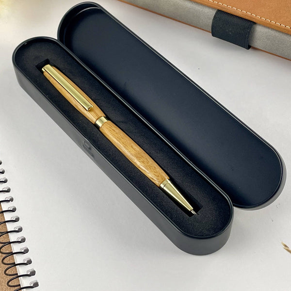 Stylo acajou doré dans sa boite métal cadeau. Stylos Déclinaisons