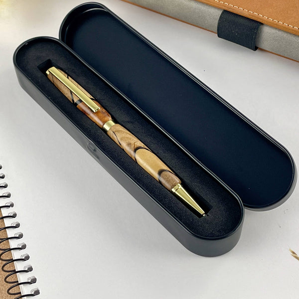 Stylo bille en bois précieux et résine noire dans sa boite cadeau métal. Stylos Déclinaisons